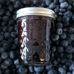 blueberry jam in a bowl of fresh blueberries