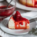 strawberry lemon marmalade on top of a piece of cheesecake