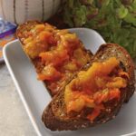 a plate of sunrise marmalade on hearty whole wheat toast