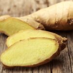 fresh ginger on a wood table