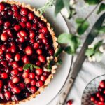beautiful cranberry tart on a white tablecloth